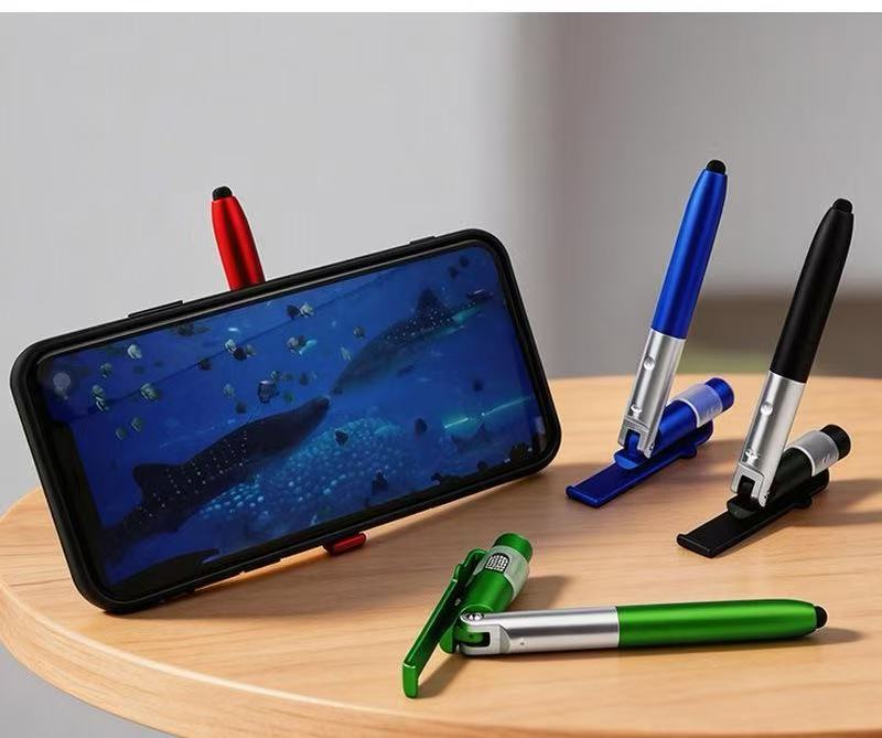 Multi Function Toy Pen 4 in 1  - Phone Holder recension och pris
